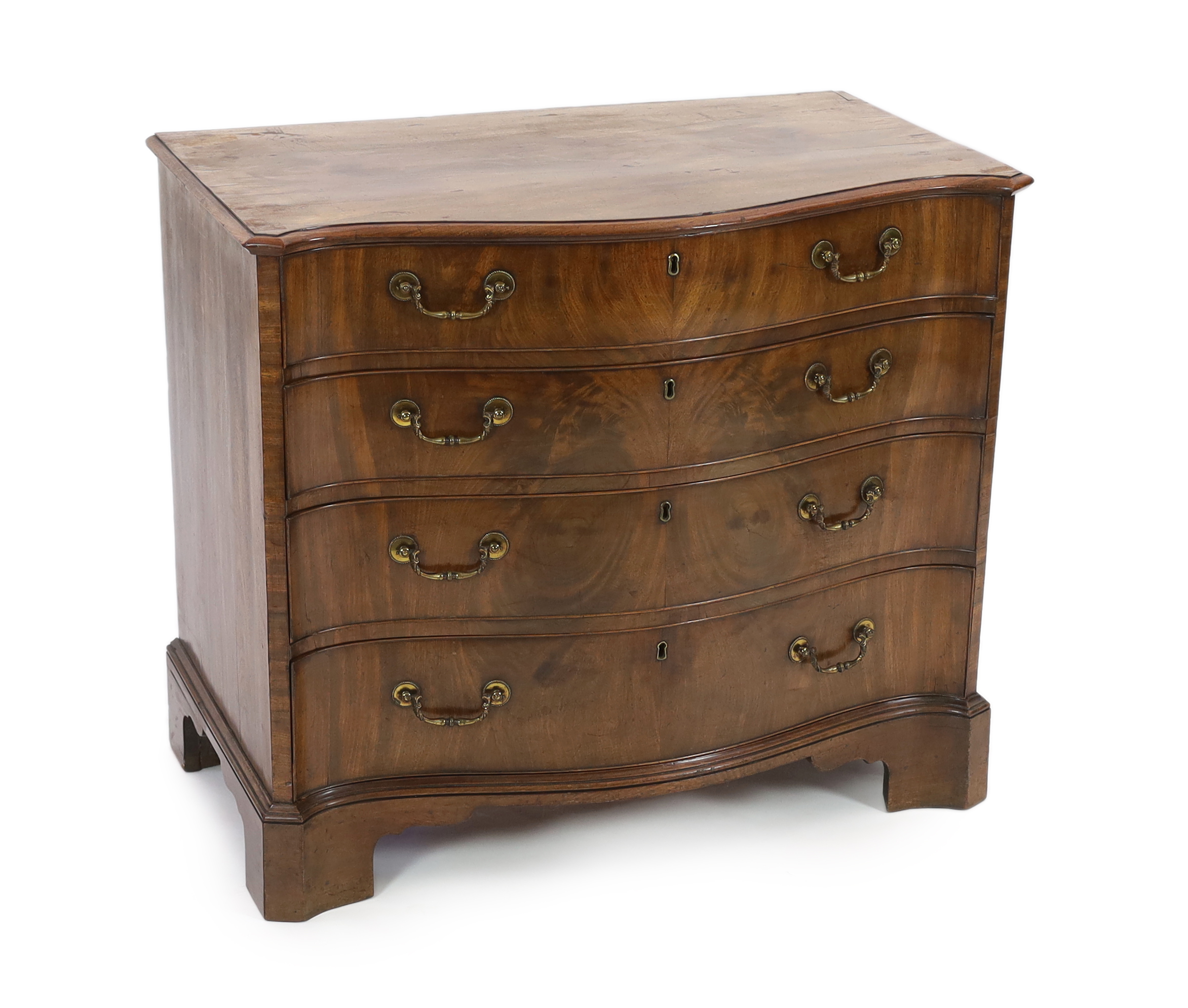 A George III mahogany serpentine dressing chest